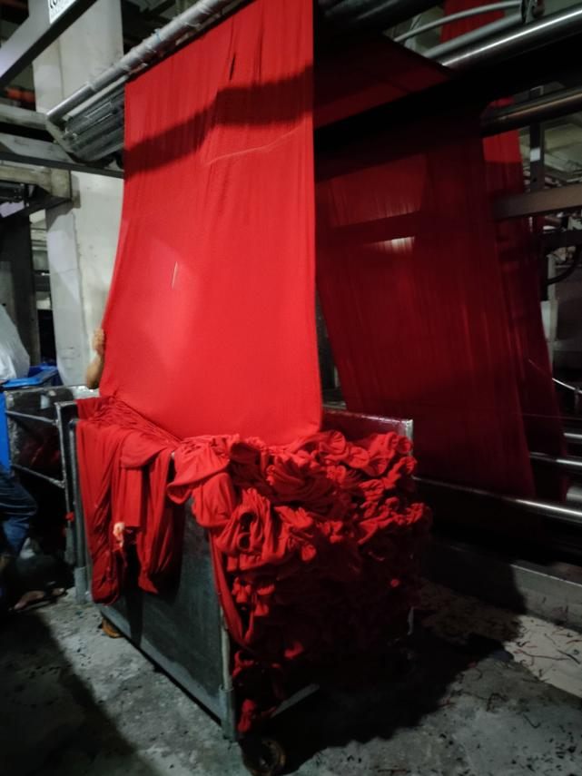 Dyeing machine with red fabric